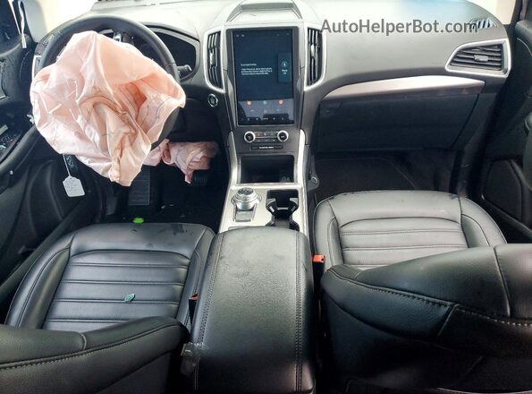 2FMPK4J99RBA64154 2024 FORD EDGE Blue Widok deski rozdzielczej