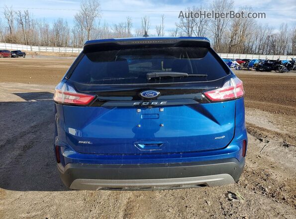 2FMPK4J99RBA64154 2024 FORD EDGE Blue Widok z tyłu