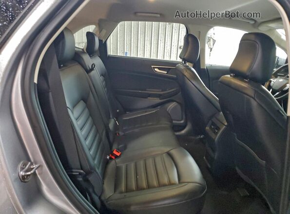2FMPK4J99RBA82167 2024 FORD EDGE Silver Rear seats view