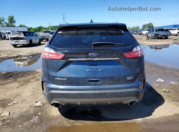 2FMPK4J9XKBB60929 2019 FORD EDGE Blue Вид ззаду