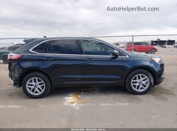2FMPK4J9XNBA88134 2022 FORD EDGE Blue Вид задньої частини салону