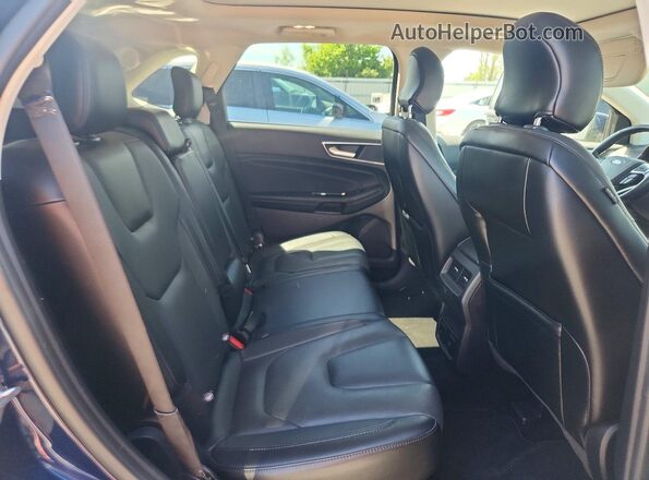 2FMPK4K81HBC47892 2017 FORD EDGE Blue Vista interior trasera