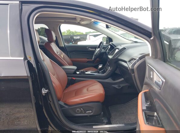 2FMPK4K84GBC59338 2016 FORD EDGE Черный Вид салона спереди