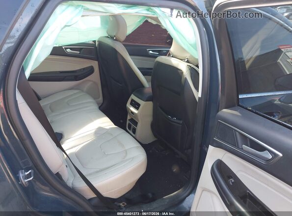 2FMPK4K90KBB40882 2019 FORD EDGE Blue Widok naklejki z numerem VIN
