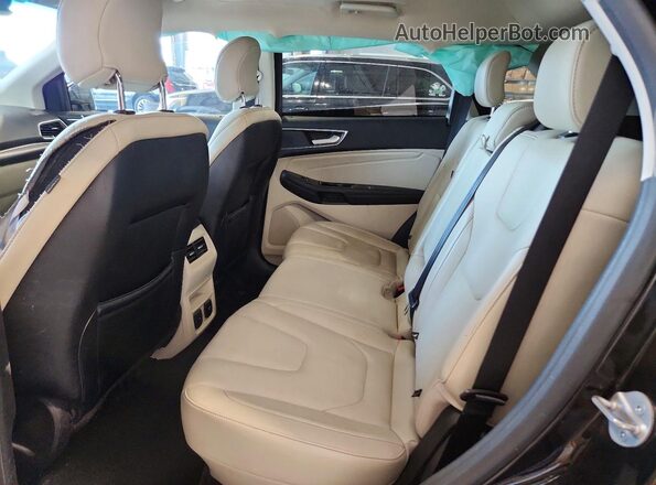 2FMPK4K90KBB61487 2019 FORD EDGE Black Vista interior trasera