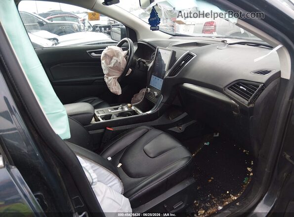 2FMPK4K91NBA66926 2022 FORD EDGE Green Widok wnętrza z przodu