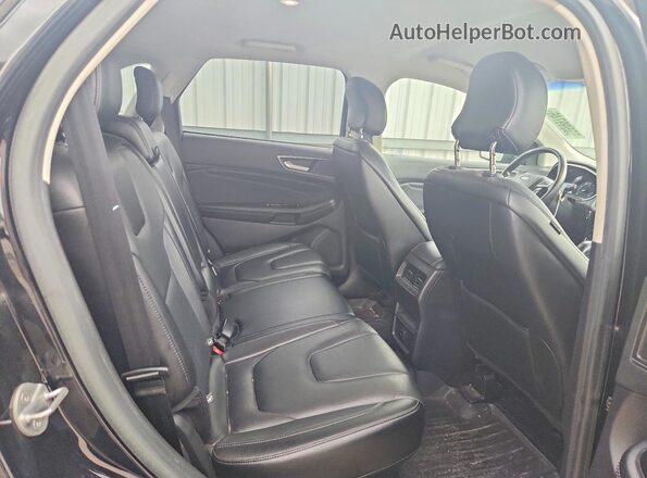 2FMPK4K92HBB20139 2017 FORD EDGE Черный Вид задней части салона