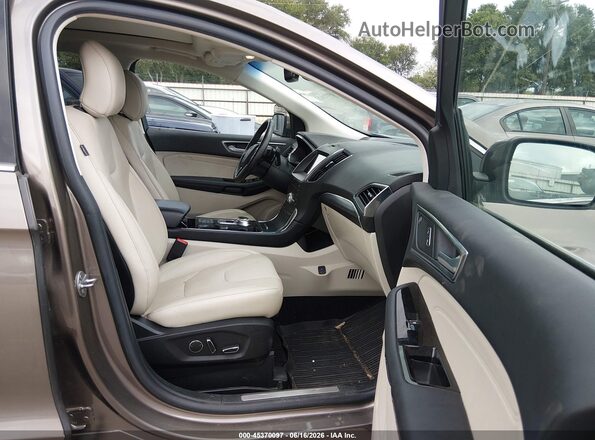 2FMPK4K94KBB93228 2019 FORD EDGE Brown წინა სალონის ხედი