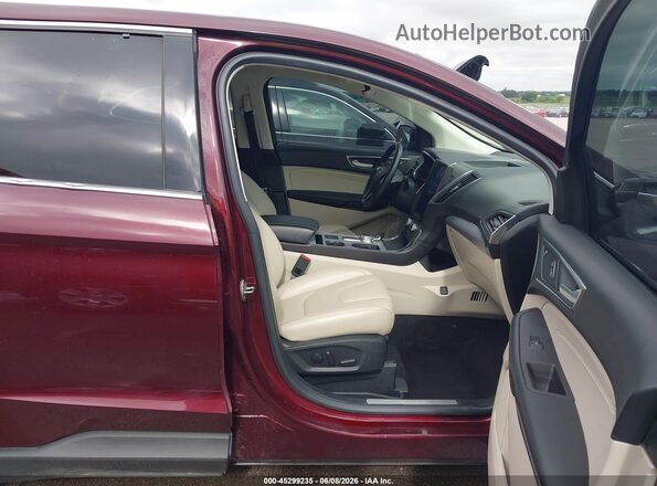 2FMPK4K94MBA34955 2021 FORD EDGE Maroon Vista interior delantera