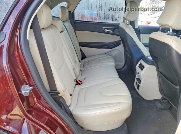 2FMPK4K94NBA04274 2022 FORD EDGE Burgundy Vista interior trasera