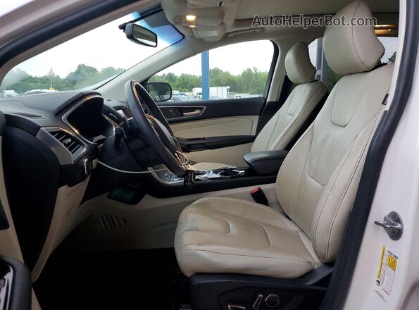 2FMPK4K97HBB19312 2017 FORD EDGE White Front interior view