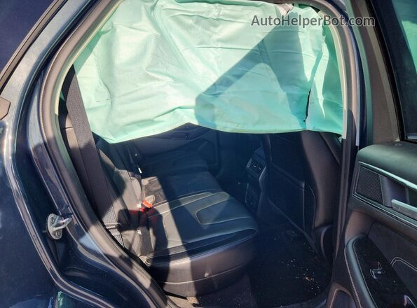2FMPK4K98KBB12893 2019 FORD EDGE Blue Widok wnętrza z tyłu