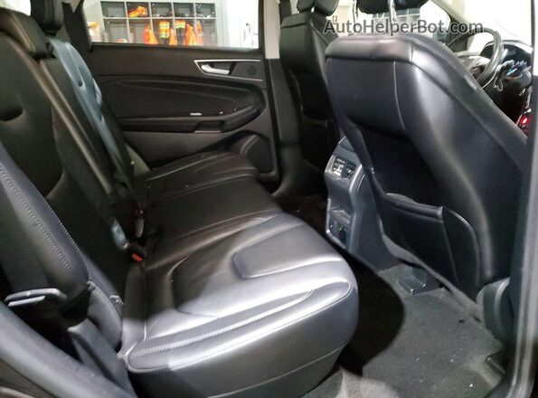 2FMPK4K98KBC24609 2019 FORD EDGE Black Вид задньої частини салону