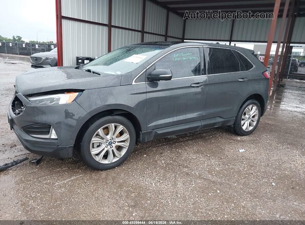 2FMPK4K98MBA04454 2021 FORD EDGE Black Vista tres cuartos delantera izquierda