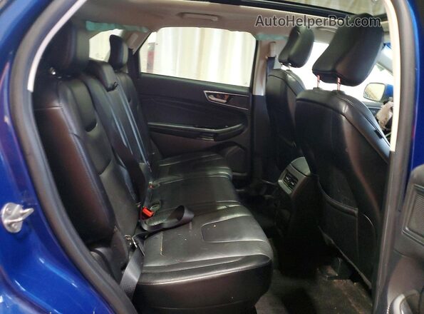 2FMPK4K99LBA00864 2020 FORD EDGE Blue Vista interior trasera
