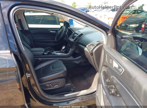 2FMPK4K9XGBB44218 2016 FORD EDGE Черный Вид салона спереди