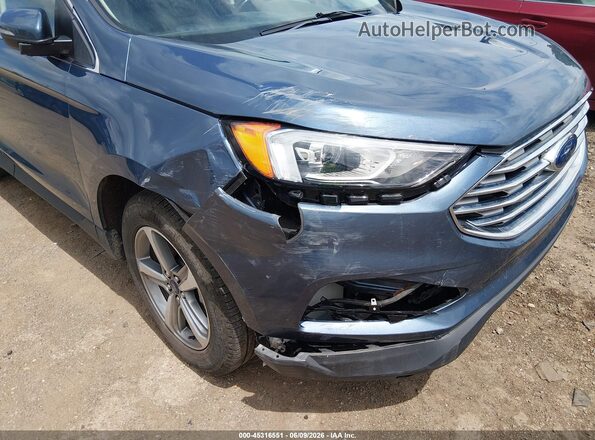 2FMPK4K9XKBC26040 2019 FORD EDGE Blue Front view