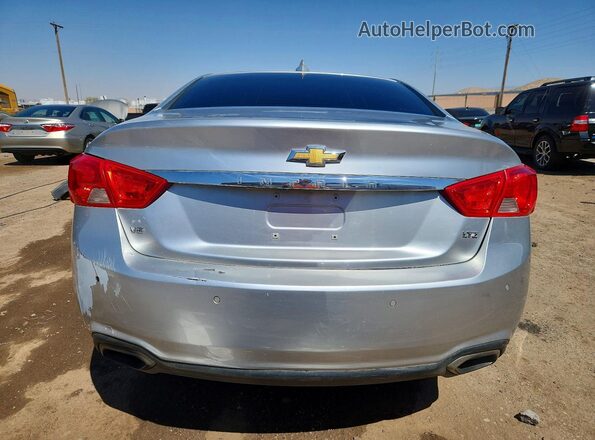 2G1145S34G9135018 2016 CHEVROLET IMPALA Серебряный Вид сзади