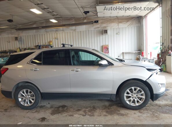 2GNAXJEV0J6278097 2018 CHEVROLET EQUINOX Silver Vista interior trasera