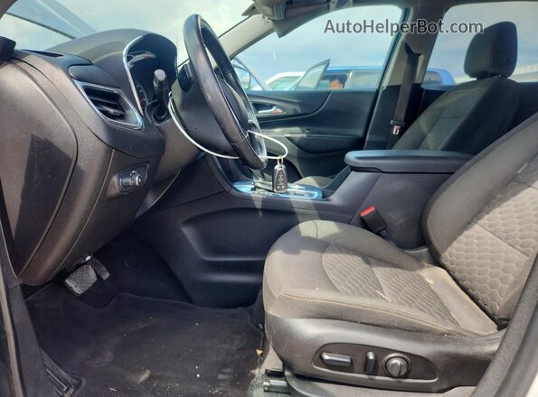 2GNAXJEV4J6229727 2018 CHEVROLET EQUINOX Silver Front interior view