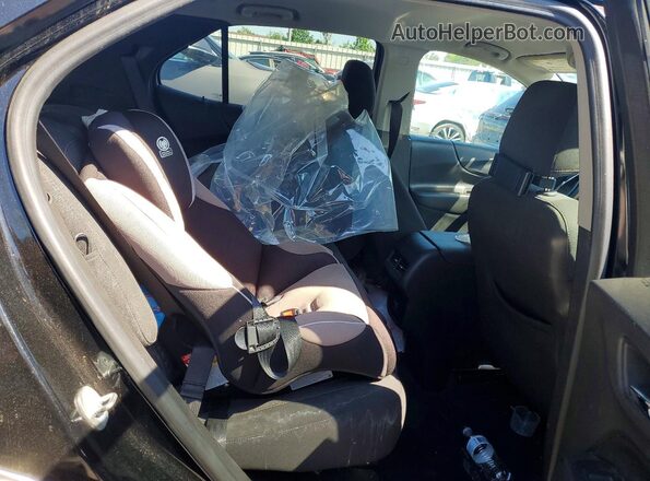 2GNAXSEV8J6280167 2018 CHEVROLET EQUINOX Черный Вид задней части салона