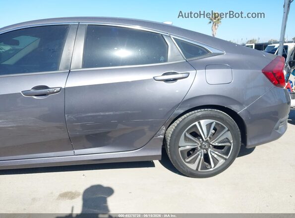 2HGFC1F32GH635222 2016 HONDA CIVIC Gray Rear interior view