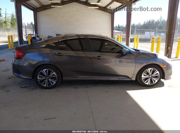 2HGFC1F48HH659406 2017 HONDA CIVIC Gray Vista interior trasera