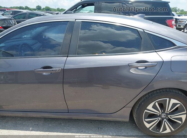 2HGFC1F73HH647674 2017 HONDA CIVIC Gray Vista interior trasera