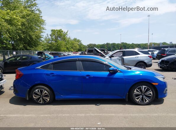 2HGFC1F74HH644203 2017 HONDA CIVIC Blue Вид задньої частини салону