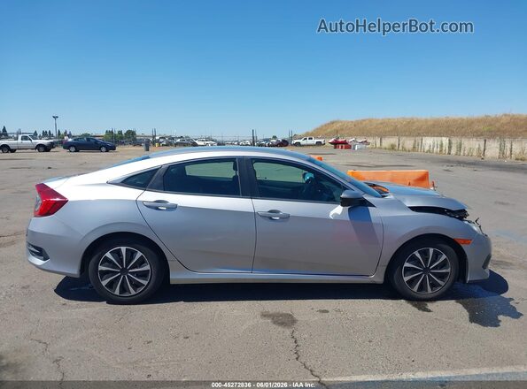 2HGFC2F50JH503378 2018 HONDA CIVIC Silver Vista interior trasera