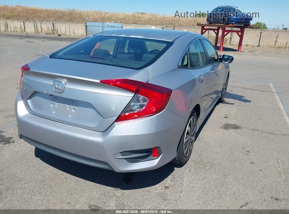2HGFC2F50JH503378 2018 HONDA CIVIC Silver Trasero derecho