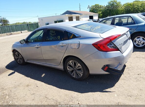 2HGFC2F51JH540083 2018 HONDA CIVIC Silver Widok wnętrza z tyłu