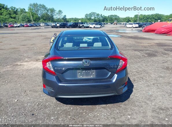 2HGFC2F52JH593228 2018 HONDA CIVIC Gray 