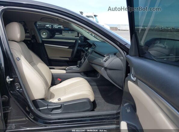 2HGFC2F53GH546377 2016 HONDA CIVIC Black Front interior view