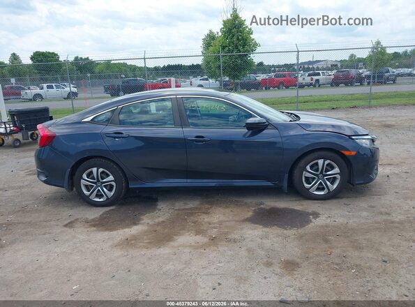 2HGFC2F54JH522452 2018 HONDA CIVIC Gray Rear interior view