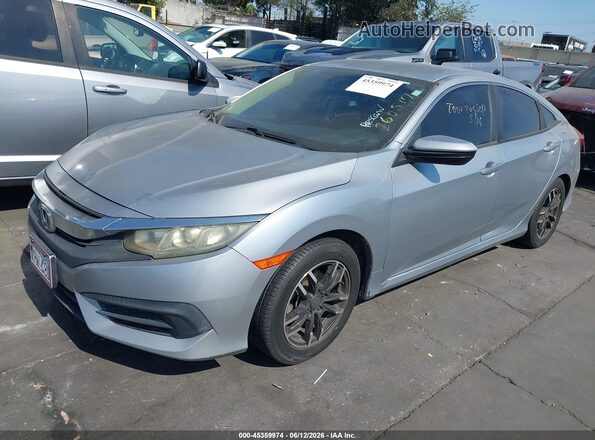 2HGFC2F55GH518421 2016 HONDA CIVIC Серебряный Передняя левая четверть