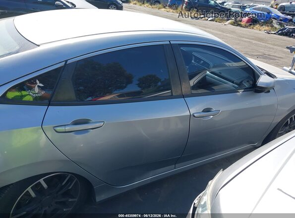 2HGFC2F55GH518421 2016 HONDA CIVIC Серебряный Вид задней части салона