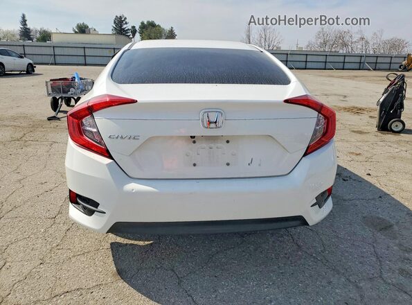 2HGFC2F55JH609244 2018 HONDA CIVIC White Rear view