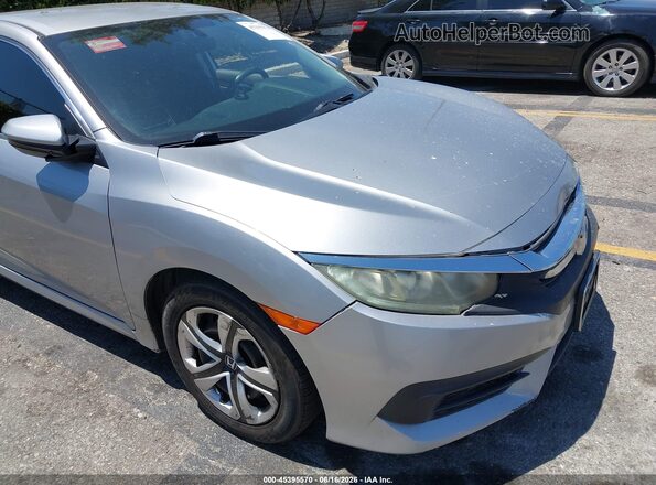 2HGFC2F56GH558684 2016 HONDA CIVIC Silver Вид задньої частини салону