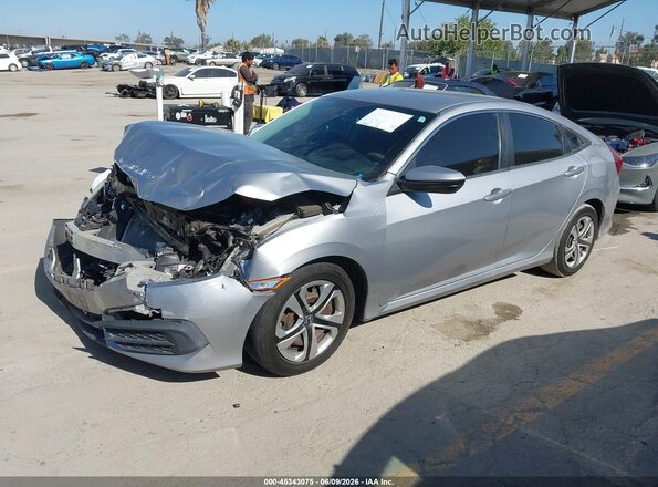 2HGFC2F56HH517070 2017 HONDA CIVIC Silver Vista tres cuartos delantera izquierda