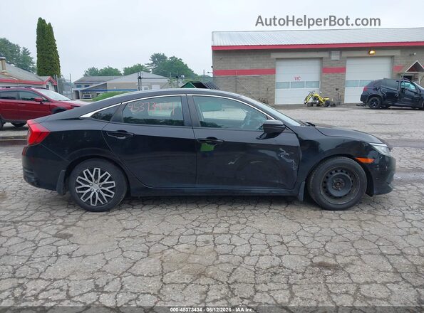 2HGFC2F57HH517482 2017 HONDA CIVIC Черный Вид задней части салона