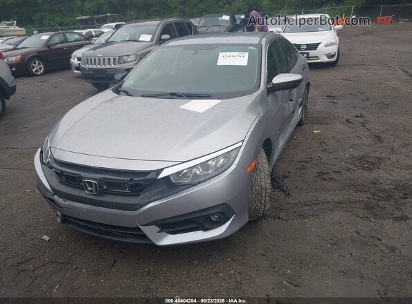 2HGFC2F58JH527217 2018 HONDA CIVIC Silver Передня ліва чверть