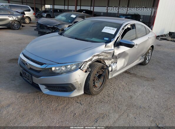 2HGFC2F59JH583098 2018 HONDA CIVIC Silver Przód lewy