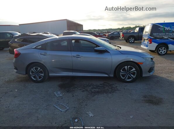 2HGFC2F59JH583098 2018 HONDA CIVIC Silver Widok wnętrza z tyłu