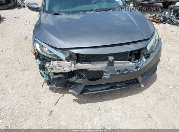 2HGFC2F5XJH555052 2018 HONDA CIVIC Gray Вид спереду