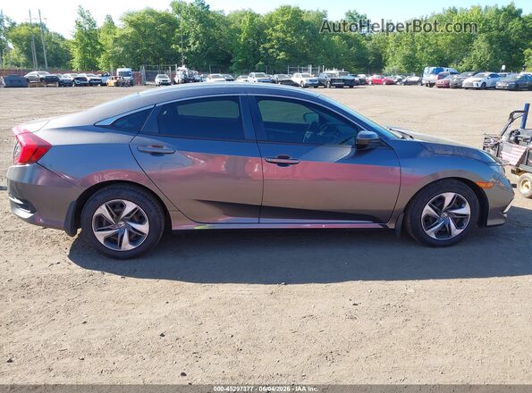 2HGFC2F63KH579669 2019 HONDA CIVIC Gray Rear interior view