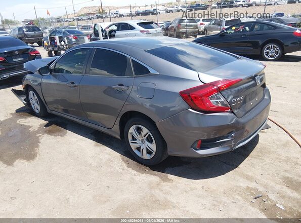 2HGFC2F66KH502505 2019 HONDA CIVIC Silver Trasero izquierdo