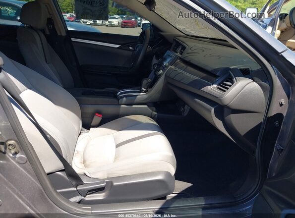 2HGFC2F69KH558034 2019 HONDA CIVIC Gray Vista interior delantera