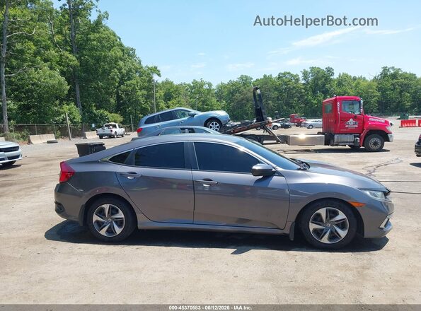 2HGFC2F69KH558034 2019 HONDA CIVIC Gray Vista interior trasera
