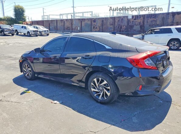 2HGFC2F70HH558067 2017 HONDA CIVIC Black Trasero izquierdo